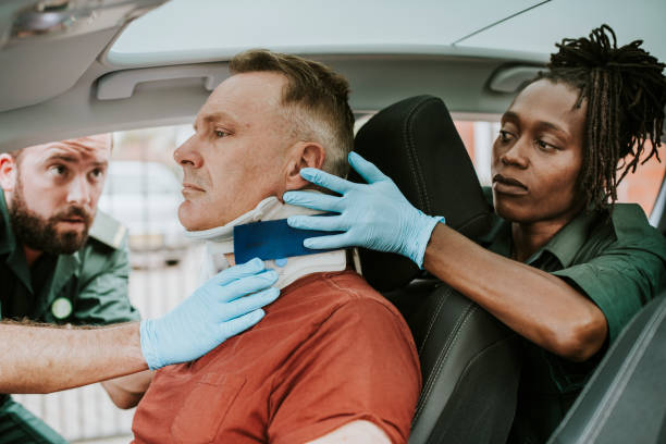 Accident victim receiving emergency assistance